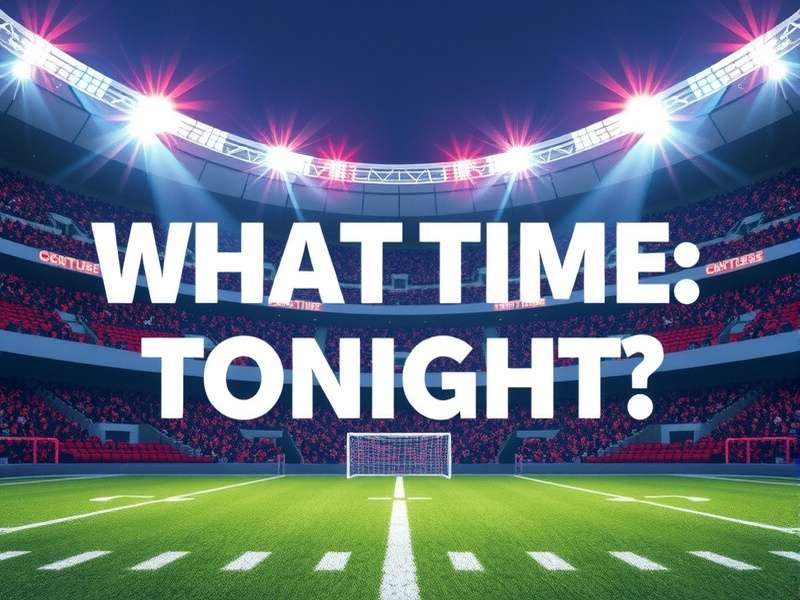 Football stadium at night with floodlights illuminating the pitch